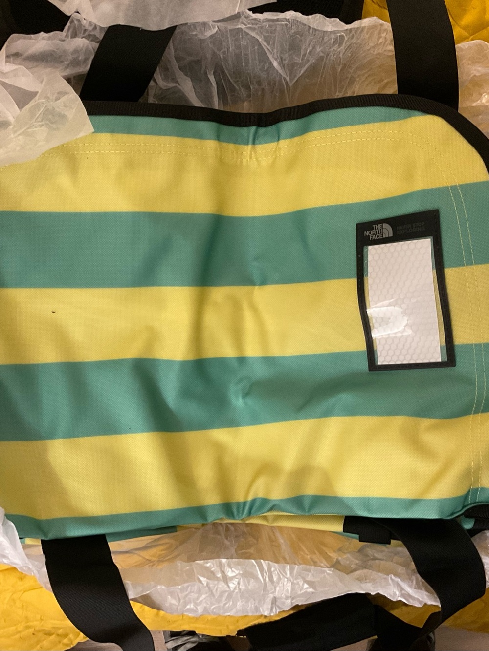 The North Face Yellow & Teal Striped Duffel Bag
